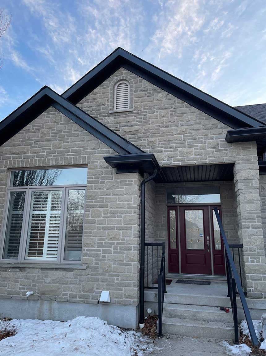 Completed roofing project with GAF architectural shingles and lifetime warranty